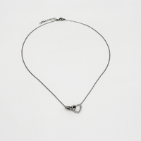Collier/bracelet tendance en acier inoxydable plaqué or avec chaîne à maillons gravée et double fermoir en forme de cœur – Bijoux de mode en gros