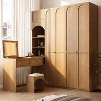 Armoire sur mesure VC Home, design élégant et éco-responsable, avec tiroirs intégrés, pour chambre à coucher tendance.