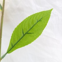 Vente en gros de fleurs d'herbe de poisson artificielles en plastique beige, adaptées aux mariages et aux célébrations de festival