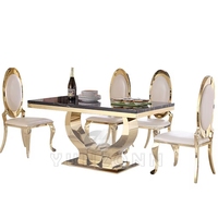 Ensemble de table à manger moderne Offre Spéciale avec plateau en marbre noir et cadre en acier inoxydable doré pour maison, villa, appartement ou hôtel