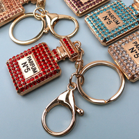 Porte-clés en métal en gros, style vintage créatif, avec strass et cristaux, incrustation de diamants, flacon de parfum Cha.nel