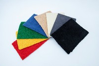 Tapis d'exposition personnalisable en nylon 6.6 rose : Rouleau haute densité ignifuge et antistatique pour les stands de marques de luxe