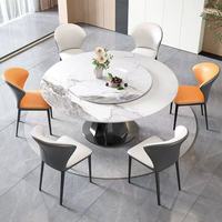 Ensemble table et chaises de salle à manger modernes et minimalistes avec plateau en pierre brillante ; Table à manger pivotante compacte pour petites maisons, au design élégant