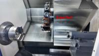 Tour CNC à lattes Supertech TK50D, centre de tournage de précision à grande vitesse avec changeur d'outils automatique pour la production de masse