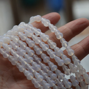 ลูกปัดหินอาเกตธรรมชาติทรงน้ำเต้า ขนาด 6x9 มม. สีขาว สำหรับทำเครื่องประดับ รูปทรงผสมผสาน สลักลาย ต้นกำเนิดจากจินหัว - Product Image 3