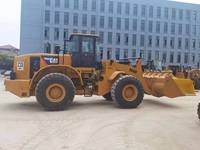 Chargeuse sur pneus Caterpillar 966H d'occasion, peinture d'origine, cabine ROPS avec climatisation, système hydraulique stable