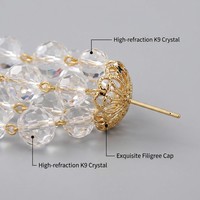 Boucles d'oreilles pendantes JinSpark 'Celestial Chime' en or véritable plaqué 18 carats avec cristaux blancs, inspirées des carillons éoliens, à pampilles multicouches