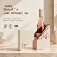 Boîte cadeau unique pour vin mousseux à coupe inclinée, avec couvercle et base, en carton gris spécial avec col intérieur métallisé or rose