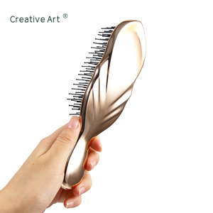 แปรงหวีผมไนลอนเคลือบไฟฟ้าแบบหรูหราสำหรับผู้หญิง ยี่ห้อ OEM ผลิตภัณฑ์ส่วนตัว สำหรับจัดแต่งทรงผม รุ่นญี่ปุ่น - Product Image 4