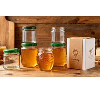 Stoples Kaca Bulat Food Grade 25ml-1000ml dengan Tutup Logam Kedap Udara untuk Penyimpanan Madu, Selai, Jelly, dan Acar