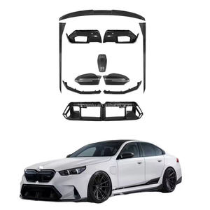 ชุดแต่งคาร์บอนไฟเบอร์แห้ง สำหรับ BMW G90 M5 MP ประกอบด้วยลิ้นกันชนหน้าคาร์บอนไฟเบอร์, ดิฟฟิวเซอร์, สปอยเลอร์, สเกิร์ตข้าง, และกระจกมองหลัง - Product Image 1