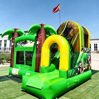 Château gonflable de luxe avec toboggan, thème Jungle Tropicale Palmiers, pour événements et fêtes