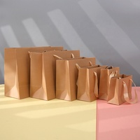 Sac shopping en papier kraft avec poignée, nouveau design, sac en papier kraft brun personnalisé pour vêtements