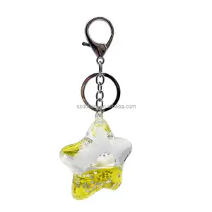 Clear acrylic yellow sparkle seals floating glitter liquid star keychain