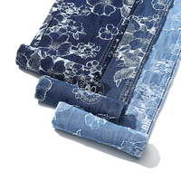 Tissu en denim jacquard bleu à fleurs 80% coton pour jeans 11,8 oz Tissu en denim de haute qualité en gros
