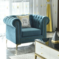 Canapé sectionnel Chesterfield en velours bleu avec pieds dorés et boutons