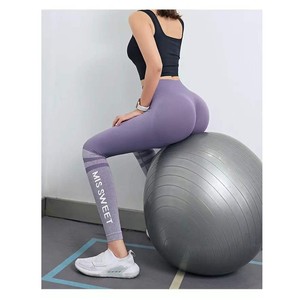 TY Hip-Lifting Nine-Point Leggings Pantalones de entrenamiento de fitness delgados de secado rápido en Internet Celebrity Letter Style Yoga - Product Image 2