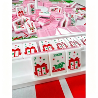 Ensemble de Mahjong pliable en acrylique de style américain moderne et luxueux sur le thème de Noël rose, motifs Père Noël et rennes, jeu pour 4 joueurs, soirée de jeu