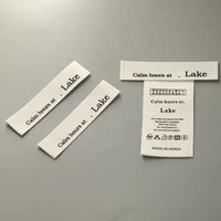 Usine personnalisé pas cher prix coton lavage étiquette imprimé doux cou vêtements étiquettes en coton nom de marque haute qualité étiquettes d'origine