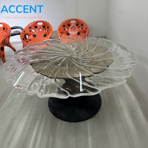 Table à manger ronde en fibre de verre, style feuille de lotus, avec piétement en forme de sablier côtelé et plateau en verre trempé, pour une décoration moderne et luxueuse de la maison - Product Image 1