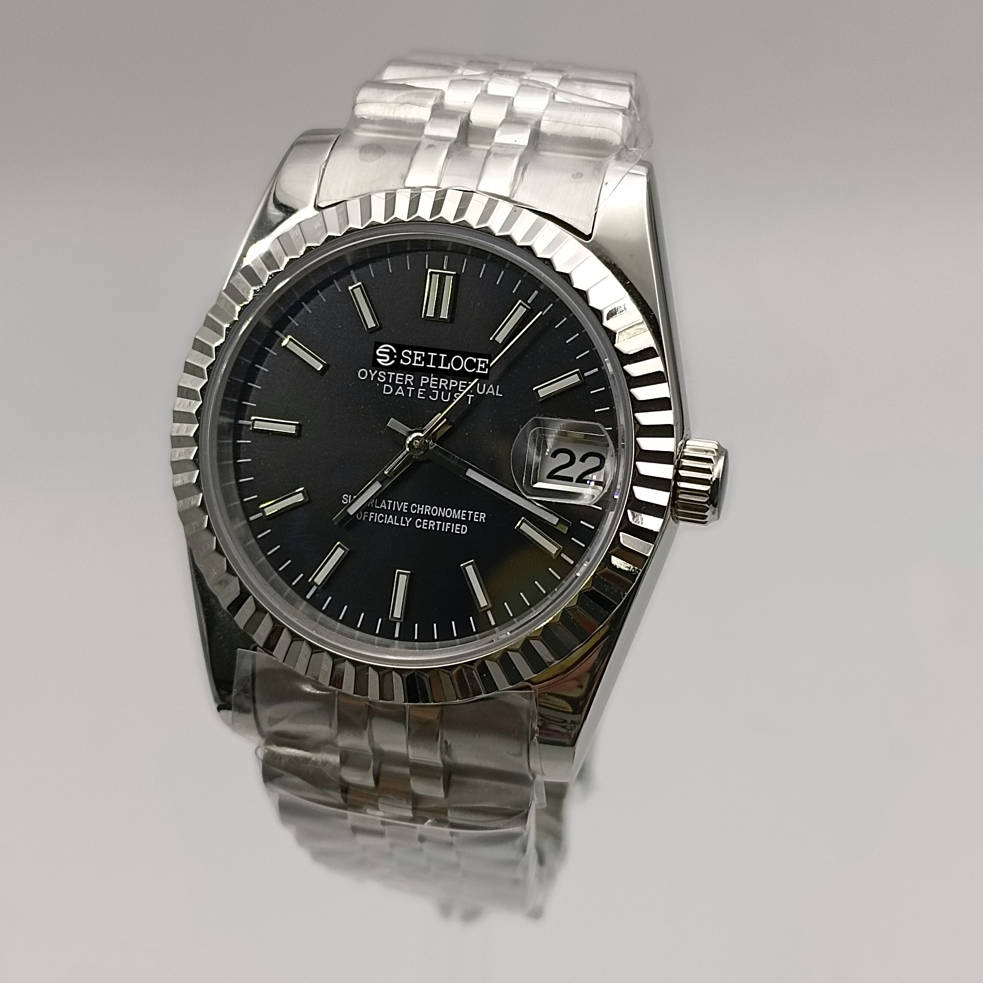 Boîtier argenté + cadran noir