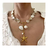 Collier tendance en acier inoxydable plaqué or 18 carats PVD, avec grosses étoiles de mer, coquillages et perles, idéal pour les vacances d'été à la plage