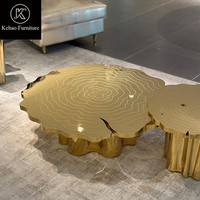 Table basse de luxe à emboîtement, sculptée en anneaux d'arbre, en acier inoxydable doré, avec plateau irrégulier en forme de tranches, pour salon de villa