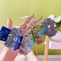 2023 créatif 3D dinosaure planète pliant Pop livre Flipbook porte-clés enfantin Puzzle jouet Animal voiture porte-clés livre porte-clés