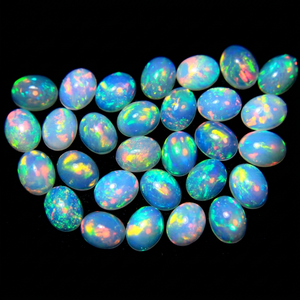 Lot de pierres précieuses opale éthiopienne de qualité AAA+ 3 x 5 mm/0,20 carats, forme ovale, opale multi-feu, opale authentique, opale calibrée Welo Fire - Product Image 1