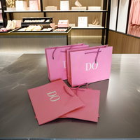 Sacs en papier de luxe roses pour bijoux, perruques et cosmétiques, sacs cadeaux personnalisés pour boutiques de détail pour filles avec logo