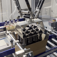 Robot parallèle intégré pour l'érection et le scellage de boîtes, pour le ramassage de bouteilles, de boissons et de canettes