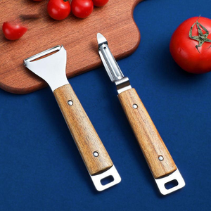 Vente en gros de gadgets de cuisine Syh319, éplucheur en acier inoxydable, écraseur de pommes de terre, multifonctionnel pour légumes et fruits, avec manche en bois - Product Image 3