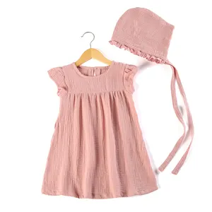帽子付き女の赤ちゃんのための2歳の女の子のドレスフリルスリーブ卸売モスリン綿ドレス