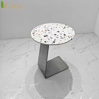 Table basse ronde de luxe U-best avec base en métal doré et plateau en marbre pour la décoration des hôtels, des halls, des bars et des restaurants