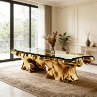 Table basse moderne de luxe en verre noir avec base en fibre de verre dorée pour salons contemporains