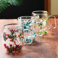 Verre à vin, café ou thé à double paroi avec poignée, originalité : fleur séchée à l'intérieur