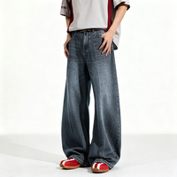Pantalon en jean délavé bleu style urbain de haute qualité, coupe déchirée, versions homme et femme, style ample à jambe large