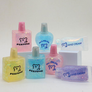 Juguete Antiestrés Transparente con Forma de Botella de Perfume, con Polvo Dorado, para Apretar, Botellas de Crema de Manos y Esmalte de Uñas - Product Image 1