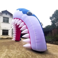 Arche gonflable personnalisée en tissu Oxford imperméable en forme de bouche de requin avec ventilateur intégré pour événements extérieurs et publicité sur le thème de l'océan