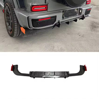 Diffuseur de pare-chocs arrière en fibre de carbone véritable style B900 compatible avec Mercedes-Benz Classe G G63 G500 W463A W464 2019-2024