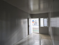 Maison conteneur pliable de haute qualité, longue durée de vie, isolée en laine de roche, structure en acier, certifiée CE, maison préfabriquée pour villa et complexe hôtelier