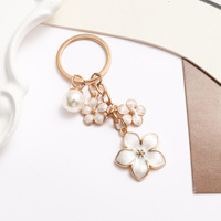 Mini porte-clés tendance en émail avec perles et fleurs pour clé de voiture, cadeau pour femmes et hommes, pendentif de sac à main, accessoires de bijoux DIY