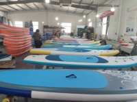 Planche de surf gonflable de course haute vitesse ISUP, construction Drop Stitch, conception personnalisée, fournisseur OEM en gros pour sports nautiques