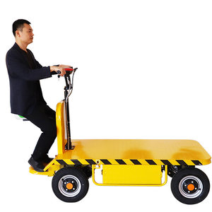 Carrello Elettrico Giallo a Pianale Pieghevole a Quattro Ruote per Trasporto Carichi e Sollevamento su Cantiere - Product Image 1