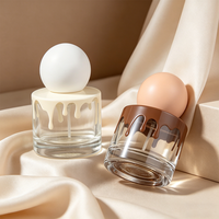 Flacons de parfum ronds vides personnalisés par le fabricant, luxueux et exquis, en verre transparent de 30 ml, avec vaporisateur.