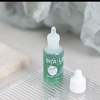 Agent hémostatique stérilisant pour salon de manucure, arrêt du saignement, flacons cylindriques bleus et verts de petite taille, liquide pour soins des ongles