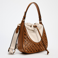 Nouveaux petits sacs à main en cuir végétalien pour femmes à la mode unique avec logo personnalisé Sacs seau de luxe avec cordon de serrage en paille pour dames