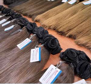 Calidad de lujo Nuevo diseño Cabello humano vietnamita Cabello virgen atado a mano Extensiones de cabello de trama invisible plana Genius Trama En stock - Product Image 5