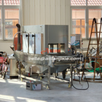 Machine automatique de brûlage des plumes de volaille à gaz pour abattoirs