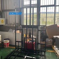 Monte-charge hydraulique pour entrepôt avec rail de guidage, machine de levage de marchandises verticale à vendre